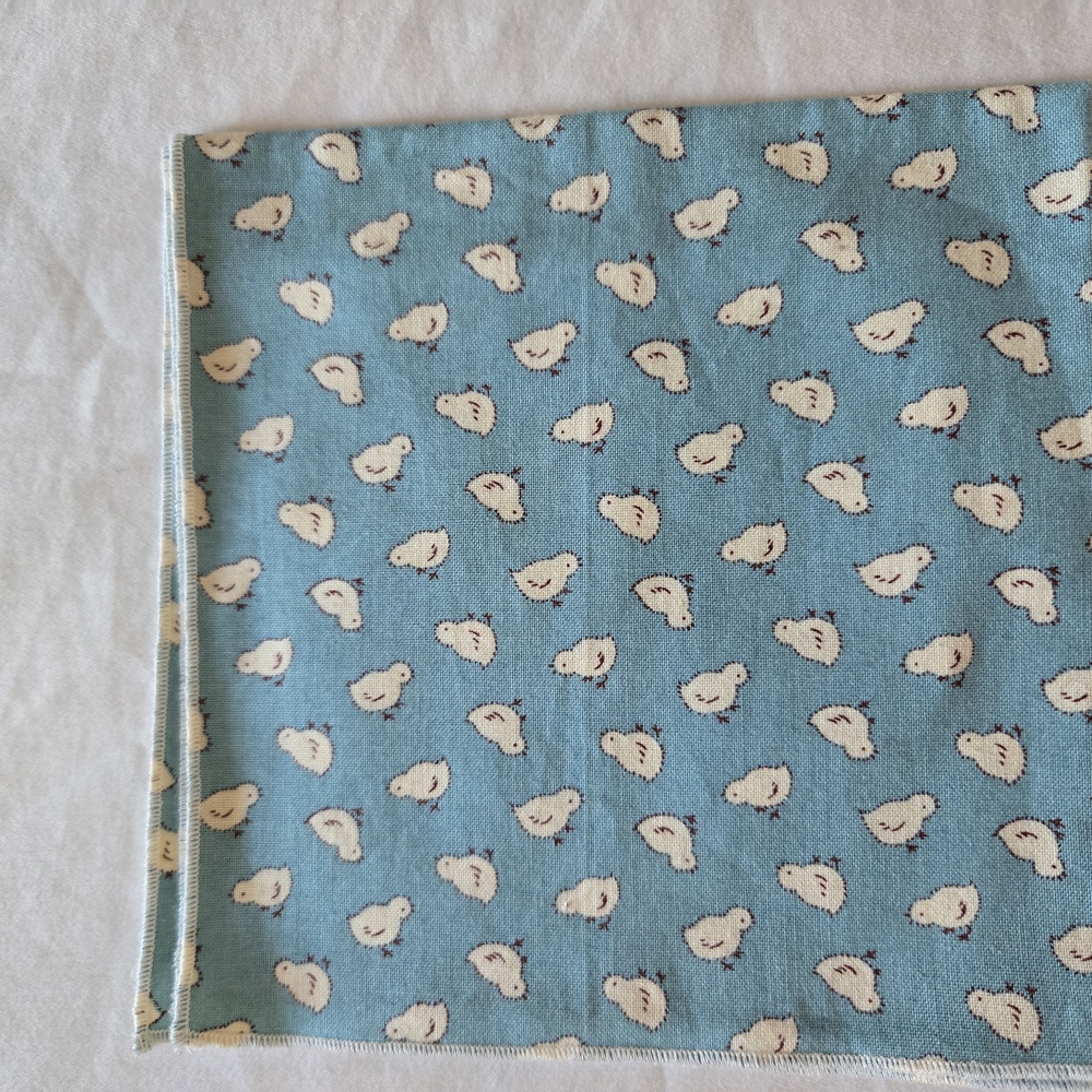 Blue Fabric with White Chick Pattern